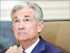  ?? WIN MCNAMEE/AFP ?? Federal Reserve Board Chairman Jerome Powell says the central bank will do what it takes to keep the US economy afloat.