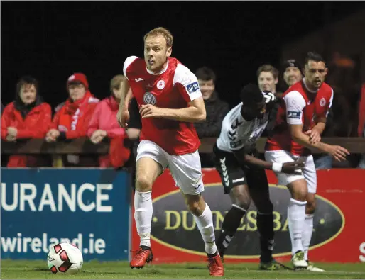  ??  ?? Craig Roddan clears the danger following a Bohemians opportunit­y. Pics: Carl Brennan.