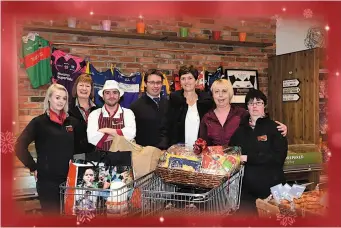  ??  ?? Derry Murphy (centre) with staff members Cliona O’Sullivan, Denise Rawson, Martin Godfrey, Orla Murphy and customers Shani O’Donoghue and Maria Hegarty at Murphy’s SuperValu, Kenmare.