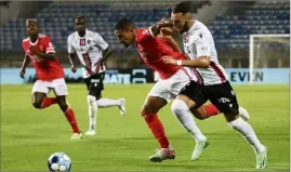  ?? ?? A gauche du 4-3-3 de Lucien Favre, Amine Gouiri a été contenu par la défense du Benfica Lisbonne.