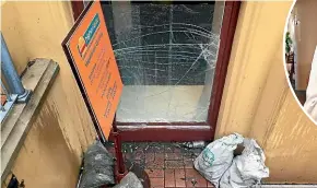  ?? RUBY MACANDREW/STUFF ?? It appears rainwater built up outside the window for several hours before the pressure became powerful enough to break the window, flooding the entire premises.
The damage was found by Jagdish Prasad, inset.