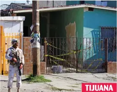  ?? ?? Start: A soldier keeps guard outside the warehouse where tunnel starts in Mexico