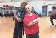  ?? LORI NICKEL / MILWAUKEE JOURNAL SENTINEL ?? Nettie Richardson and Peggy Harvey practice a routine for the Bucks Grand Dancers at Elite Sports Club-River Glen.