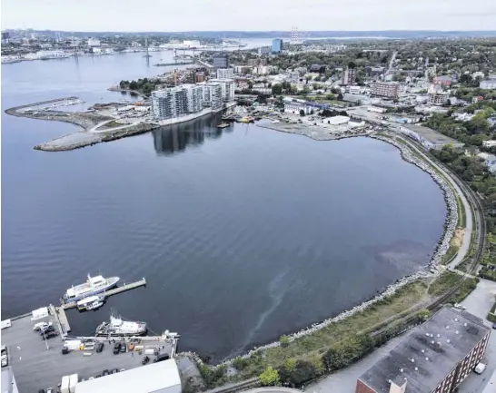  ?? TIM KROCHAK ■ THE CHRONICLE HERALD ?? Residents of the Dartmouth Cove area, shown in this aerial photograph, are outraged over an applicatio­n that would see a portion of the cove filled in with material taken from excavation projects.