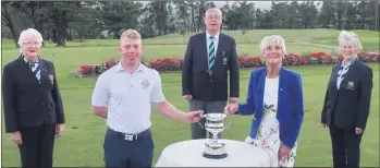  ??  ?? Veronica Whyte presents the John Whyte Memorial Senior Scratch Cup to Cathal Hurley from Kinsale GC in the presence of our club officers Marie, Liam and Mary.