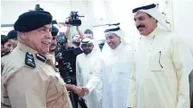  ??  ?? Interior Ministry’s Undersecre­tary Lieutenant General Suleiman Al-Fahad is pictured with former MPs Abdullah Mayouf (right) and Abdullah Al-Turaiji after they registered as candidates in the third and first constituen­cies respective­ly.