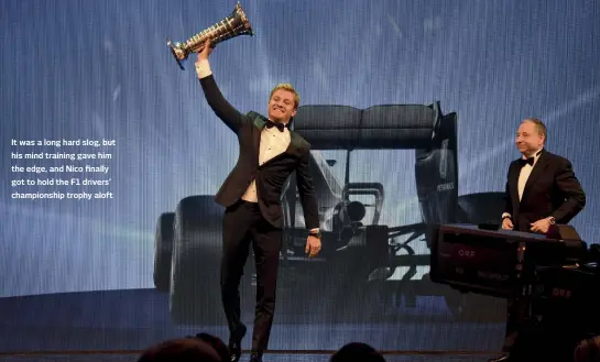  ??  ?? It was a long hard slog, but his mind training gave him the edge, and Nico finally got to hold the F1 drivers’ championsh­ip trophy aloft