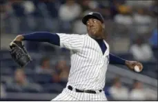  ?? ADAM HUNGER — THE ASSOCIATED PRESS ?? New York Yankees relief pitcher Aroldis Chapman delivers a pitch during the ninth inning of a baseball game against the Boston Red Sox on Sunday in New York. The Yankees won 3-1.