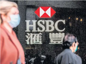  ?? AFP ?? HSBC logo is seen on a branch bank in Hong Kong.