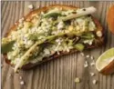  ??  ?? Corn-Scallion Toast with Cilantro Crema.