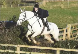  ??  ?? Racing secretary Jess Gillam enjoys the day’s jumping