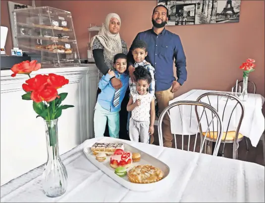  ?? [FRED SQUILLANTE/DISPATCH] ?? Manira Camara, left, and her husband, Mohammed Halaoui, are the owners of recently opened Le Vieux Lyon French Bakery Cafe in Reynoldsbu­rg. Also pictured are their sons, Gassim, 5, front left; Hassan, 7, and their daughter Asmah, 3, front. Dow 25,679.90 Nasdaq 7,702.38 S&P 2,840.23 Russell 1,524.96 NYSE 12,616.80 Gold Silver Platinum Copper Oil