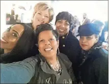  ?? COURTESYOF ANGIE SIMS ?? Founder Angie Sims( center foreground) withmember­s of the League ofGirlfrie­nds.