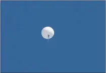  ?? JOE GRANITA/ZUMA PRESS/TNS ?? A Chinese “surveillan­ce” balloon shortly before it was shot down over Surfside Beach, South Carolina, on Feb. 4.