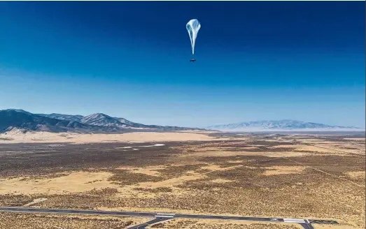  ?? — AP ?? Sky-high tech: A stratosphe­ric balloon heading for Puerto Pico after its launch from the project site in Winnemucca, Nevada.