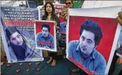  ?? FAREED KHAN / AP 2017 ?? Members of a Pakistani civil society group demonstrat­e in Karachi, Pakistan, in April against the mob killing of university student Mohammad Mashal Khan in Mardan that month over blasphemy charges.