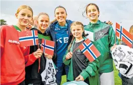  ?? Photo / Photosport ?? Young fans pose with Ingrid Engen during the Norway women’s team training at Seddon Fields in Auckland.
