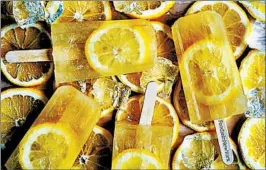  ?? VALLERY LOMAS PHOTO Prep: ?? Lomas uses just three ingredient­s in her lemonade frozen pops: lemons, honey and water.