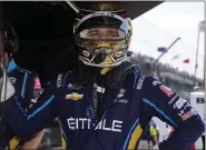  ?? AP ?? Conor Daly waits for his crew to ready his car during practice for the Indianapol­is 500 at Indianapol­is Motor Speedway on Friday.