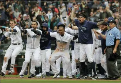  ?? THE ASSOCIATED PRESS ?? The Mariners are poised to return to the postseason for the first time since 2001.