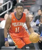  ?? Rick Scuteri Associated Press ?? JRUE HOLIDAY is still young and improving but his three-point shooting could use a little work.