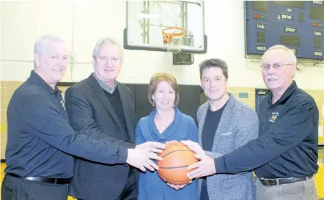  ?? BERND FRANKE/ STANDARD STAFF ?? From left, co- convener Don Larman, Mountainvi­ew Homes chief financial officer Rick Podrebarac, Notre Dame vice- principal Colleen Quinn- Boyer, Mountainvi­ew Homes operations manager Mike Memme and co- convener John Witlib promote the 63rd Tribune Boys...