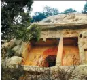  ?? PHOTOS PROVIDED TO CHINA DAILY ?? From left: The Buddha head sculpture is the 100th cultural relic item retrieved by China from overseas in 2020. An external view of Cave 8 in Tianlongsh­an Grottoes in Shanxi, where the sculpture was stolen in around 1924.