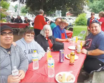  ?? Emily M. Olson / Hearst Connecticu­t Media ?? Above, Prime Time House in Torrington celebrated its 30th anniversar­y with a picnic on the Main Street grounds on Friday. From left are Miguel Zayas, Lisa Thibodeau, Barbara Gilman, Doug Oakley and Joey Raydenbow.