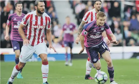  ??  ?? Duncan Watmore gets away from Stoke City defender Erik Pieters last weekend. Picture by Frank Reid