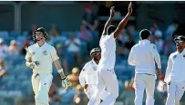  ?? GETTY IMAGES ?? South Africa bowler Kagiso Rabada was initially banned for a match for an altercatio­n with Australia captain Steve Smith, left, though it was later overturned on appeal.