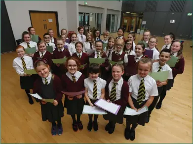  ??  ?? Members of the Garrowhill school choir Pictures: Colin Mearns