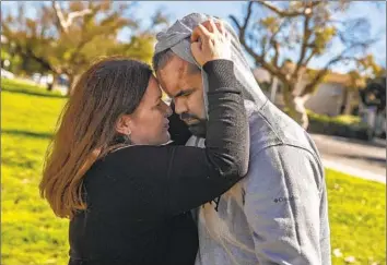  ?? Photograph­s by Mel Melcon Los Angeles Times ?? LAURA TOPETE embraces son Gregorio, 30, during an outing in Chatsworth. Gregorio, who lives at Elwyn-Mayall, a home for autistic adults, has “fallen apart,” she said, since an allegedly abusive incident there.