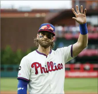  ?? MATT SLOCUM — THE ASSOCIATED PRESS ?? Phillies’ Bryce Harper waves before addressing the crowd at Citizens Bank Park before a game against the Miami Marlins.