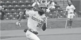  ?? ?? OU's Rocco Garza-Gongora runs to first base during the Sooners' game against Rider at L. Dale Mitchell Park in Norman on Feb. 24. STEVE SISNEY, THE OKLAHOMAN