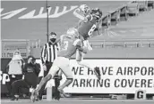  ?? ASHLEY LANDIS AP ?? USC wide receiver Amon-ra St. Brown (8) catches a pass in the end zone for the winning touchdown.