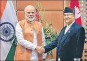  ?? PTI ?? PM Narendra Modi with his Nepal counterpar­t KP Sharma Oli on the sidelines of the Bimstec summit in Kathmandu.