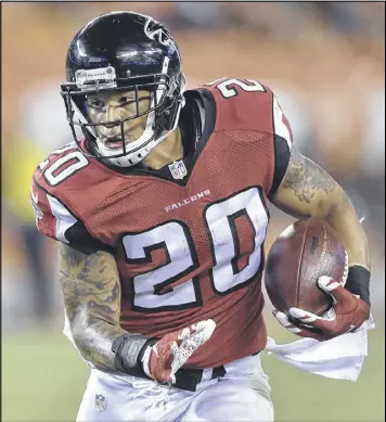  ?? DAVID RICHARD / ASSOCIATED PRESS ?? Running back Brandon Wilds is among the Falcons’ prospects who are considered “on the bubble” as the coaching staff finalizes the process of fixing a roster for the 2016-17 season.