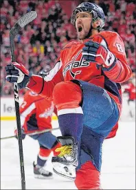  ?? AP PHOTO ?? Washington Capitals’ Alex Ovechkin celebrates his goal during the third period of Saturday’s NHL game against the New Jersey Devils in Washington. The Capitals won 5-3.