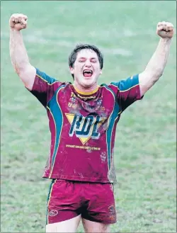  ??  ?? Big day: Anton Wereta celebrates winning the 2011 grand final.