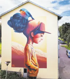  ?? Lonely Planet’s “Street Art” ?? A Gothenburg, Sweden, mural by Linus Lundin, who works under the name YASH.
