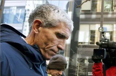  ?? STEVEN SENNE — THE ASSOCIATED PRESS ?? William “Rick” Singer founder of the Edge College &amp; Career Network, departs federal court in Boston on Tuesday after he pleaded guilty to charges in a nationwide college admissions bribery scandal.