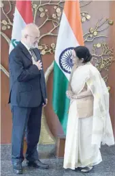  ?? — AFP ?? External Affairs Minister Sushma Swaraj with her Iraqi counterpar­t Ibrahim al Jaafari prior to a meeting in New Delhi on Monday.