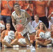  ?? ROB FERGUSON / USA TODAY SPORTS ?? Oklahoma State’s Jawun Evans was a scoring point guard who also shared the ball with his teammates.