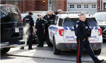  ?? Police at the scene in Barrhaven on Thursday. Photograph: Blair Gable/Reuters ??