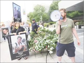  ?? Bob Luckey Jr. / Hearst Connecticu­t Media ?? Protesters demonstrat­e outside the headquarte­rs of Purdue Pharma, at 201 Tresser Blvd., in downtown Stamford, Aug. 31, 2018. Many of them had lost family and friends to fatal opioid overdoses.