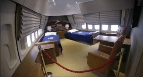  ?? THE ASSOCIATED PRESS ?? In this Sept. 18photo the presidenti­al bedroom suit is seen in the “Air Force One Experience,” a full-sized 747replica of Air Force One which is now open to the public in North Kingstown, R.I.