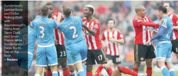  ?? — Reuters ?? Sunderland’s Lamine Kone and Didier Ndong clash with Bournemout­h’s Harry Arter, Steve Cook, and Simon Francis while Sunderland’s Fabio Borini lies on the floor.
