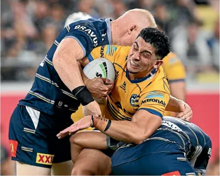  ?? GETTY IMAGES ?? Bailey Simonsson, of the Eels, is tackled in the NRL preliminar­y final win over the Cowboys. He will play in his second NRL grand final on Sunday.