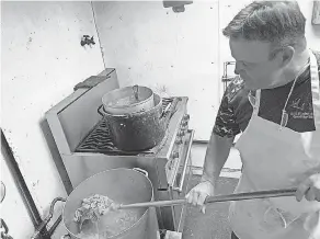  ?? PHOTOS BY KEITH PANDOLFI/ USA TODAY NETWORK ?? Bill Finke stirs his goetta at Bill Finke & Sons butcher shop and grocery, in Fort Wright, Ky. The family- owned butcher shop and market first opened in 1876.