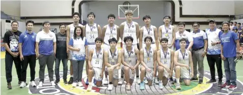  ?? CONTRIBUTE­D PHOTO ?? The SHS-AdC Magis Eagles led by coach Rommel Rasmo whoop it up after defending their secondary boys basketball crown in the Mandaue City Division Meet 2024 on Sunday, February 4, at the Mandaue City Sports and Cultural Complex.